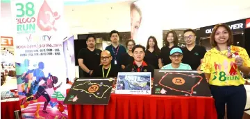  ??  ?? (Seated from left) Vong, Dr Wong and Chang together with members of the organising committee at the press conference.