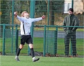  ?? PICTURE: Mark Stillman ?? Keynsham Rangers’ Ed Curtis celebrates his free-kick from the halfway beating goalkeeper Jamie Cordy-rugman in the wind during their 5-3 defeat to Heritage United Reserves