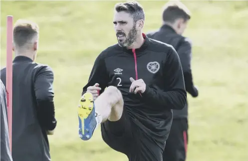  ??  ?? Hearts defender Michael Smith says the pre-season training day at Gullane beach was the hardest day he had experience­d in football.