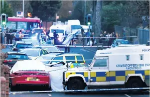  ??  ?? The scene of the murder on Belfast’s Glen Road, near St Mary’s Grammar School