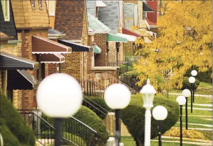  ?? Dreamstime / TNS ?? Homes on Chicago’s South Side. Black homeowners often struggle to build long-term wealth because their properties are undervalue­d — and there is no straightfo­rward, easy way to dispute an appraisal or have it changed.