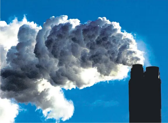  ??  ?? A coal-fired power plant. Countries must slash carbon emissions to zero by 2050 and limit dangerous global warming, a report warned.