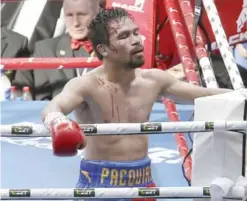  ??  ?? BRISBANE: Manny Pacquiao of the Philippine­s reacts after his loss to Jeff Horn of Australia, during their WBO World Welterweig­ht title fight in Brisbane, Australia, Sunday. —AP