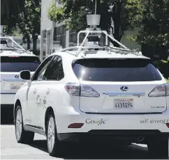  ?? ERIC RISBERG / THE ASSOCIATED PRESS ?? Google self- driving Lexus cars are among us.