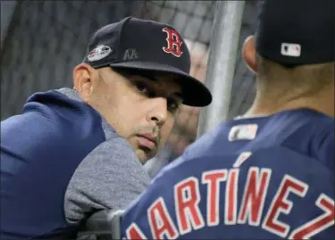  ?? BILL KOSTROUN — ASSOCIATED PRESS ?? Red Sox manager Alex Cora watches batting practice before Game 4 of the ALDS against the Yankees on Oct. 9 in New York.