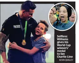  ?? KEVIN QUIGLEY ?? Selfless: Williams gives his World Cup winners’ medal to fan Charlie Line