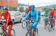  ?? Photo: CHRISTIANE HOWE ?? Full speed ahead: Island Bay cycleway supporters adorned themselves in body paint on Saturday, demanding no delays to the cycleway process.