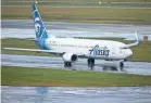  ?? PROVIDED BY CRAIG MITCHELLDY­ER ?? Alaska Airlines flight 1276, a Boeing 737-900, taxis before takeoff from Portland Internatio­nal Airport in Portland, Ore., on Jan. 6.