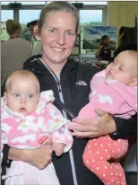  ?? Photo by Declan Malone ?? Denise O’Sullivan with her hands full of twins Cate and Emilia at the launch of the Summer Festival on Wednesday.