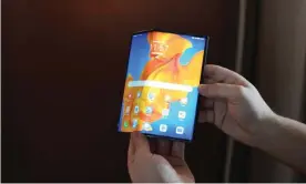  ??  ?? Huawei hopes the unique design of the second iteration of its folding smartphone-tablet hybrid is attractive enough to overcome the lack of Google services. Photograph: Samuel Gibbs/The Guardian