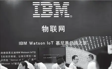  ?? ZHANG PEIJIAN / FOR CHINA DAILY ?? A billboard promoting IBM’s IoT (internet of things) solutions is seen at the company’s booth during a high-tech expo in Ningbo, Zhejiang province.