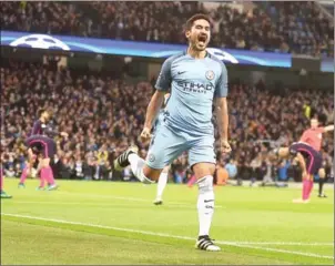  ?? PAUL ELLIS/ AFP ?? Manchester City midfielder Ilkay Gundogan celebrates scoring in the UEFA Champions League Group C match against Barcelona on Tuesday.