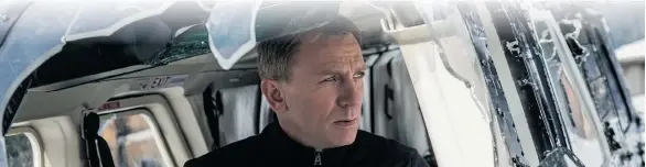  ??  ?? Top: Storm troopers march in Star Wars: Episode VII — The Force Awakens. Above: Daniel Craig makes his fourth appearance as superspy James Bond in Spectre.