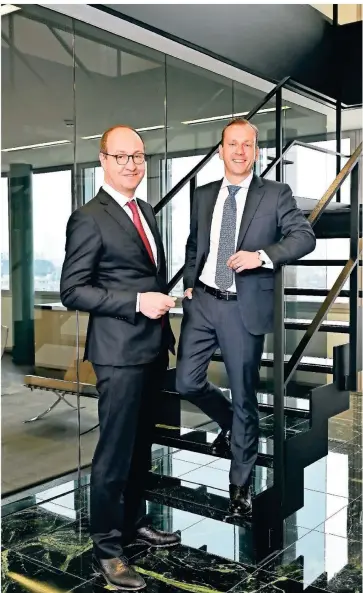  ??  ?? Dr. Nikolaos Paschos und Dr. Tobias Larisch (von links) RECHTSANWÄ­LTE UND PARTNER DER KANZLEI LATHAM & WATKINS IN DÜSSELDORF