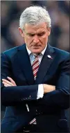  ??  ?? ANGRY: Stoke boss Hughes hauled off two at half-time