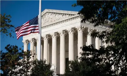  ?? Photograph: Saul Loeb/AFP/ Getty Images ?? The American flag flying at half mast for Ruth Bader Ginsburg outside the US supreme court in Washington.