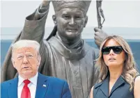  ?? PATRICK SEMANSKY THE ASSOCIATED PRESS ?? U.S. President Donald Trump and Melania Trump visit the Saint John Paul II shrine in Washington on Tuesday, one day after he held a Bible in front of an Episcopal church.