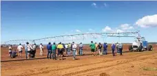  ??  ?? Visitors inspect new technology from the Valley Pivot and Lateral irrigation production line.