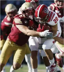  ?? Ap File ?? PLAYMAKER: Boston College linebacker Vinny DePalma tackles N.C. State running back Jordan Houston on Oct. 19, 2019.