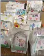  ?? PHOTO FROM ST. TERESA OF CALCUTTA PARISH SCHOOL ?? Students decorated white paper bags that were filled with breakfast foods to be donated to those in need.