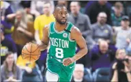  ?? Andy Lyons / Getty Images ?? Celtics guard Kemba Walker dribbles against the Indiana Pacers at Bankers Life Fieldhouse on March 10 in Indianapol­is.