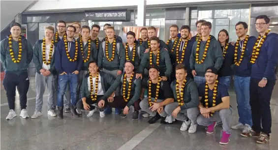  ??  ?? Members of the German team pose on their arrival in Lucknow on Sunday, ahead the Junior Hockey World Cup beginning December 8.