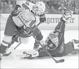  ?? Jay LaPrete Associated Press ?? COLUMBUS’ Sergei Bobrovsky makes a save against Washington’s Chandler Stephenson during Game 4 of their first-round series. The Capitals won 4-1.