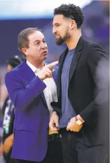 ?? Scott Strazzante / The Chronicle ?? Owner Joe Lacob and Klay Thompson, part of the pricey foursome with Stephen Curry, Draymond Green, Andrew Wiggins.
