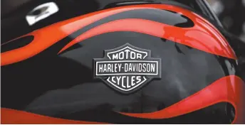  ?? CITIZEN NEWS SERVICE FILE PHOTO ?? The Harley-Davidson name is shown on the gas tank of a bike in Northbrook, Ill., in 2017. Harley-Davidson says it will take some of its production overseas due to high tariffs.