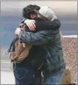  ?? JOE PENNEY / REUTERS ?? Abdullah Alghazali greets his son Ali, 13, a Yemeni who was previously prevented from boarding a plane to the US following US President Donald Trump’s executive order on travel ban, upon Ali’s arrival at JFK airport in New York on Sunday.