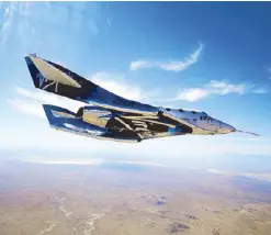  ?? AFP ?? The Virgin Galactic VSS Unity is seen during a test flight over the Mojave Desert in California last May 29.