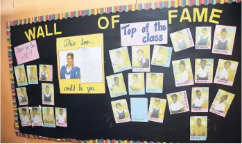  ??  ?? Wall of Fame used by teachers to promote students at Scott’s Hall Primary School in St Mary.