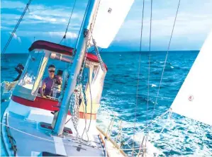  ??  ?? PREVIOUS PAGE: It took Taylor and Stephen 15 months to sail from Florida to Cape Horn
BELOW: Ole Lady sailing across the Gulf of Mexico to Puerto Juárez just before Hurricane Nate passed off the Mexican coastline