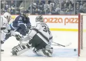  ?? TREVOR HAGAN — THE CANADIAN PRESS VIA AP ?? Winnipeg’s Kyle Connor (81) scores on Kings’ goaltender Jack Campbell as Alec Martinez arrives too late to defend.