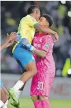  ?? Backpagepi­x ?? RONWEN Williams of Mamelodi Sundowns celebrates victory with teammates during the CAF Champions League. |