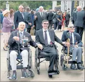  ??  ?? HEROIC: Mr Barrett at Buckingham Palace with veterans.