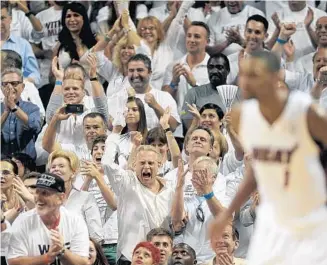  ?? PHOTOS BY MICHAEL LAUGHLIN/STAFF PHOTOGRAPH­ER ?? Miami has yet to lose a game at home during the NBA playoffs this year, but the Heat won’t be able to relax because the Spurs have proven they can win on the road.