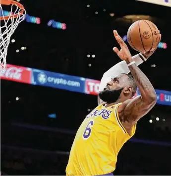  ?? Jae C. Hong/Associated Press ?? The Lakers' LeBron James has helped redefine what it means to be a star in the NBA during his 20 years in the league. Now he’s nearing one of the sport’s most hallowed records.