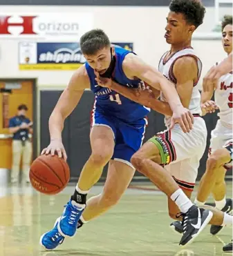  ?? Matt Freed/Post-Gazette ?? Brayden Reynolds, left, scored 42 points and made six 3-pointers when Chartiers Valley won at New Castle earlier this season.