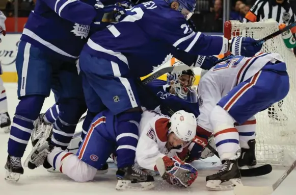  ?? RICK MADONIK/TORONTO STAR ?? Canadiens centre David Desharnais crashed Garret Sparks’ crease in Sunday night’s exhibition at the Air Canada Centre. Sparks stopped 17 of 18 shots in the Leafs’ overtime win.