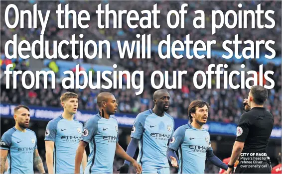  ??  ?? CITY OF RAGE: Players head for referee Oliver over penalty call