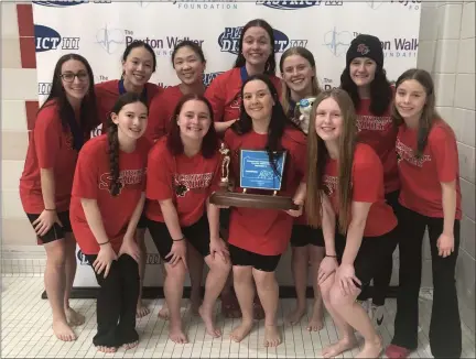  ?? ANDREW HELLER — READING EAGLE ?? The Schuylkill Valley girls swimming team poses with the trophy after winning its seventh consecutiv­e District 3Class 2A team title