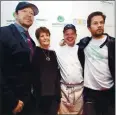  ?? WAHLBURGER­S ?? The Wahlberg brothers with mom Alma at the first Wahlburger­s opening in 2011. Since then, the restaurant chain has expanded from coast to coast, to Canada and to Germany.