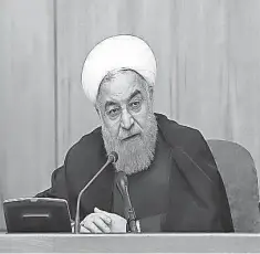 ?? PRESIDENTI­AL OFFICIAL WEBSITE HANDOUT, EPA ?? A handout photo made available by the presidenti­al official website shows Iranian President Hassan Rouhani speaking during the cabinet meeting in Tehran on Wednesday.
