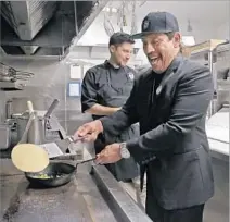  ?? Myung J. Chun Los Angeles Times ?? DANNY TREJO, right, and executive chef John-Carlos Kuramoto work in the 400-square-foot kitchen at Trejo’s Cantina.