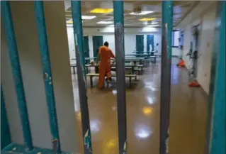  ?? JOHN RENNISON, HAMILTON SPECTATOR FILE PHOTO ?? An inmate in one of the common areas for lunch on a range in the Hamilton-Wentworth Detention Centre. The correction­al facility, commonly called the Barton Street jail, is operated by the Ontario government.