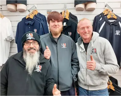  ??  ?? Paul Palmer, James Watkins and Stephen Pitts inside Black Country T-shirts’ Dudley store