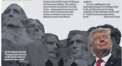  ?? Photo / AP ?? US President Donald Trump poses in front of Mount Rushmore National Memorial.