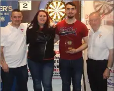  ??  ?? Plate Competitio­n winners Aishling Mc Cullough and Damien Grimes (Matthews) are congratula­ted by committee members John Andrews and Kevin Campbell.