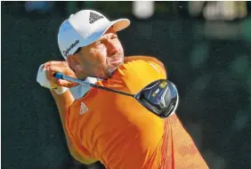  ??  ?? Sergio Garcia watches his tee shot on the first hole during a practice round Tuesday for the PGA Championsh­ip at Baltusrol Golf Club in Springfiel­d, N.J.